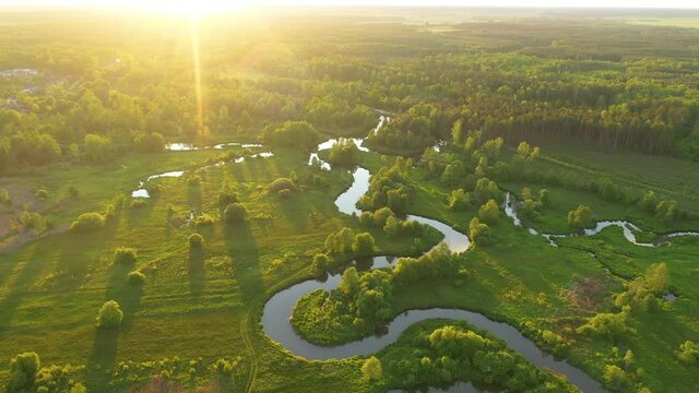 Drone aerial shot of natural meandering river	