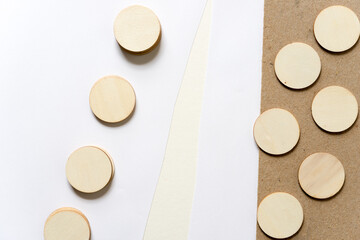 round wooden shapes on paper and board