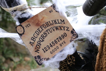 Ouija board in spooky setting