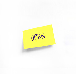 Isolated Yellow sticker with Open Handwriting text on white Whatman paper. Concept programming, testing, business. Handwriting text, copy space