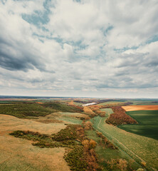 farmland aerial landscape with dark clouds