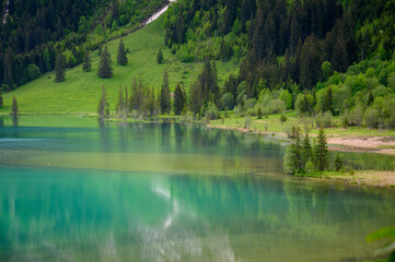 idyllic Lake Lauenensee in spring, Bernese Alps, Switzerland