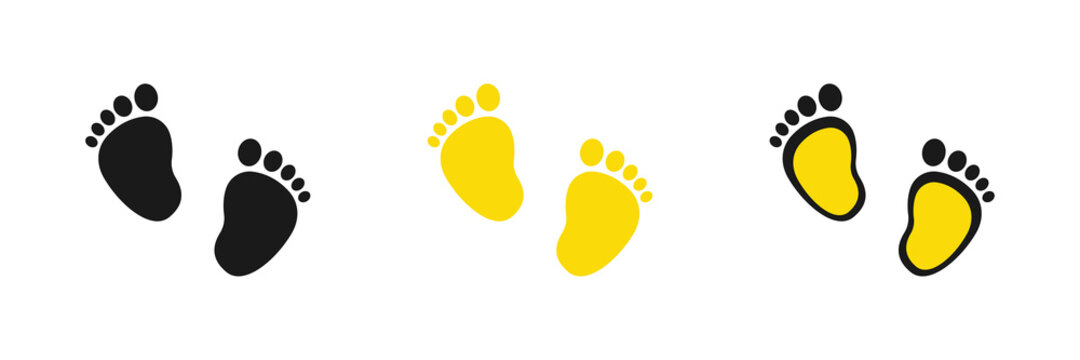 Set of vector illustrations of baby steps - pairs of black and yellow footprints in flat style