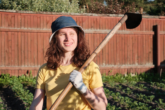 Young Caucasian Woman Female Farmer Working In The Agriculture Filed