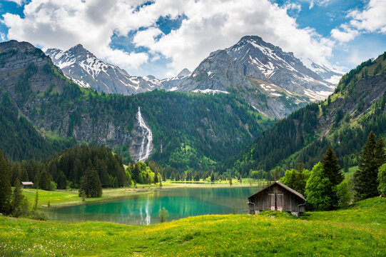 idyllic Lake Lauenensee with Wildhorn in spring, Bernese Alps, Switzerland