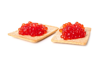 Tasty crackers with red caviar on white background