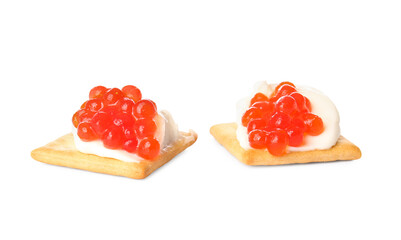Tasty crackers with cheese and red caviar on white background