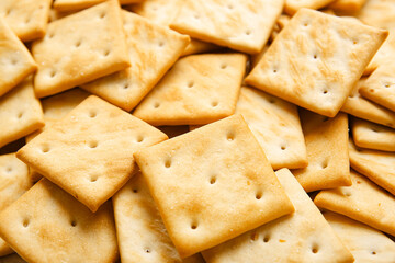 Tasty crackers as background, closeup