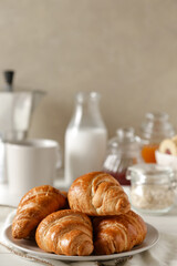 breakfast with croissant and coffee