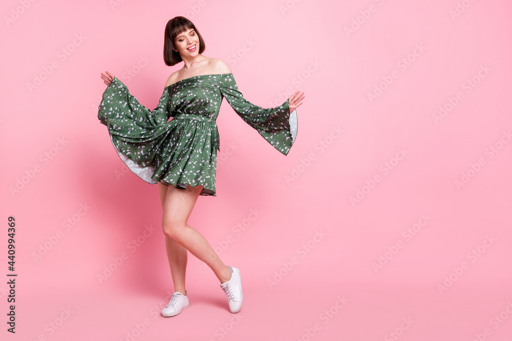 Wall mural Full length body size view of attractive dreamy cheerful girl posing dancing isolated over pink pastel color background