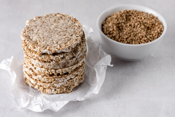 Round Crisp Healthy Gluten Free Buckwheat Crispbread on Light Gray Background Horizontal Healthy Food