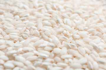 Raw rice as background, closeup