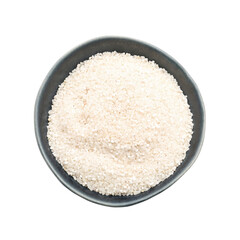 Bowl with raw rice on white background