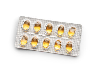 Blister package with fish oil capsules on white background