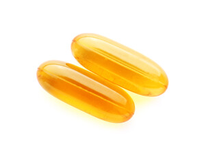 Fish oil capsules on white background