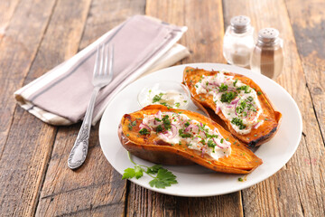 baked sweet potato with cream and herbs