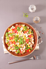 Fototapeta na wymiar mixed salad with bean, tomato and corn