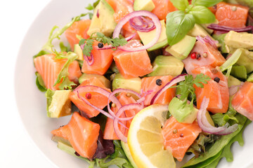 salad with salmon,  avocado and basil