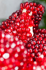 red and ripe pomegranate with juicy grains