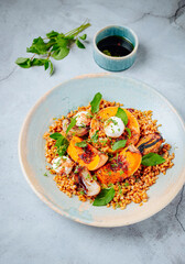 Squash, labneh, red onion & bulgur salad