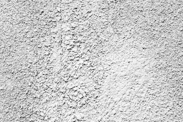 Texture of a concrete wall with cracks and scratches which can be used as a background