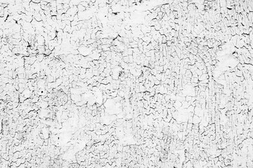 Texture of a concrete wall with cracks and scratches which can be used as a background