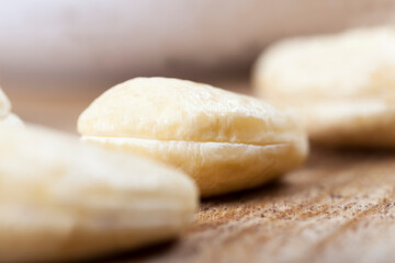 Fototapeta na wymiar delicious and healthy raw cashew nuts, close up