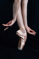 Ballerina's pointe shoes close up - 441004797