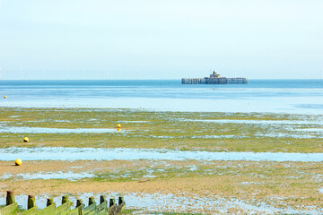 Herne Bay and surrounding areas showing pier, statue on sunny summer's day
