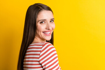 Profile side view portrait of attractive cheerful girl copy space isolated over bright yellow color background