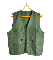 Isolated photo of green khaki hunting sleeveless jacket on hanger on white background.
