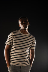 Naklejka premium Posing on black background