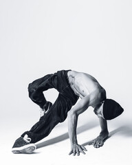 Young beautiful cool looking bboy posing in studio