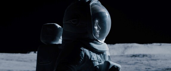 CU Portrait of Caucasian female lunar astronaut exploring Moon surface. Shot with 2x anamorphic lens © supamotion