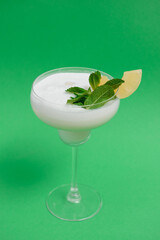 Pina Colada in front of green background
