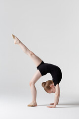 Young beautiful cool looking girl posing in studio