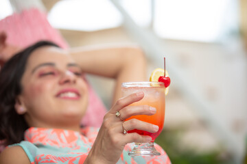 Mexican young happy healthy woman relaxing on hammock dreaming resting in summer on vacation holiday