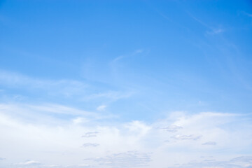 Heavenly landscape with cirrus and high-altitude cumulus clouds shot on a summer day in central Russia