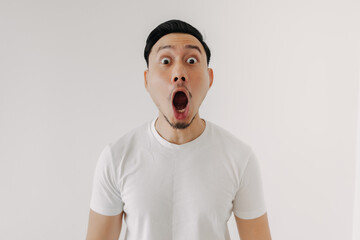 Funny shocked and surprised face of Asian man isolated on white background.