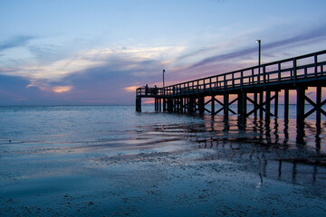 pier at sunset on mobile bay 