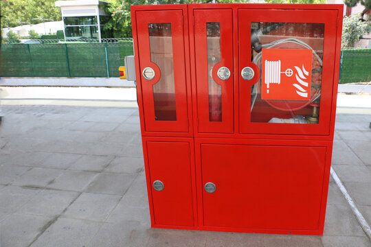 selective focus Fire extinguisher cabinets used in subway stations and factories and fire extinguisher hose inside