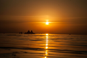 Summer sunset at sea. A resort place to relax at sunset. text place.