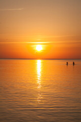 Summer sunset at sea. A resort place to relax at sunset. text place.