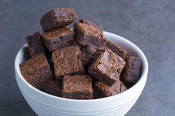 brownie cubes in a white bowl