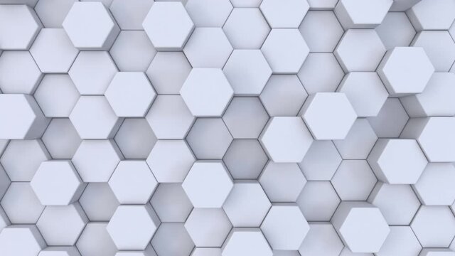 Abstract modern white hexagon geometric background. 3d animation of light, minimal, clean, moving hexagonal grid wall. Seamless looping 4k