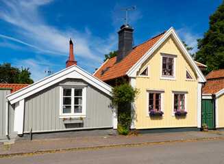 Picturesque old wooden houses in the old town of Kalmar, Sweden, in summer