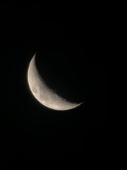 Obraz na płótnie Canvas Waxing moon in the sky