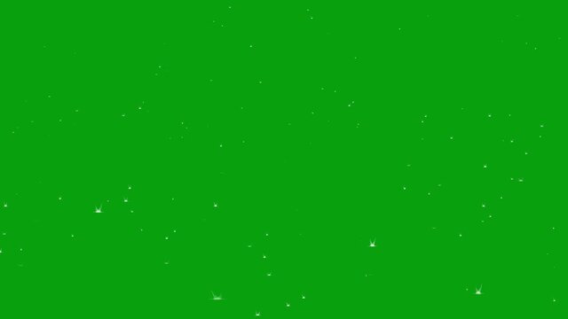 An abstract background of sparkling lights against a green chroma background in 4K