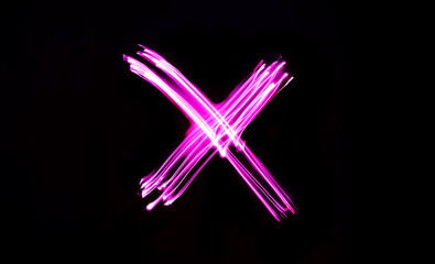 Neon letter X, pink long exposure light writes X