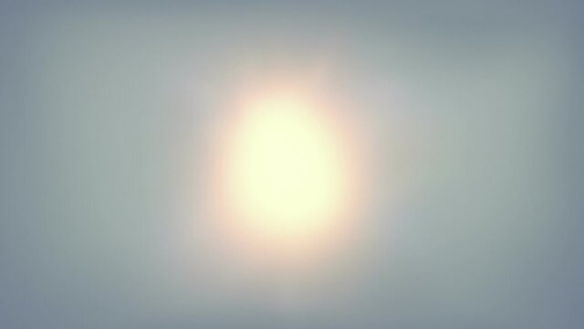 Bright Sun Shimmers Overhead In Hot Weather